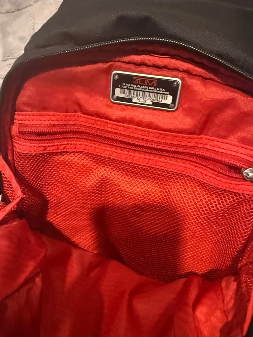 Tumi Black Nylon Men's Backpack with Red Logo Accent